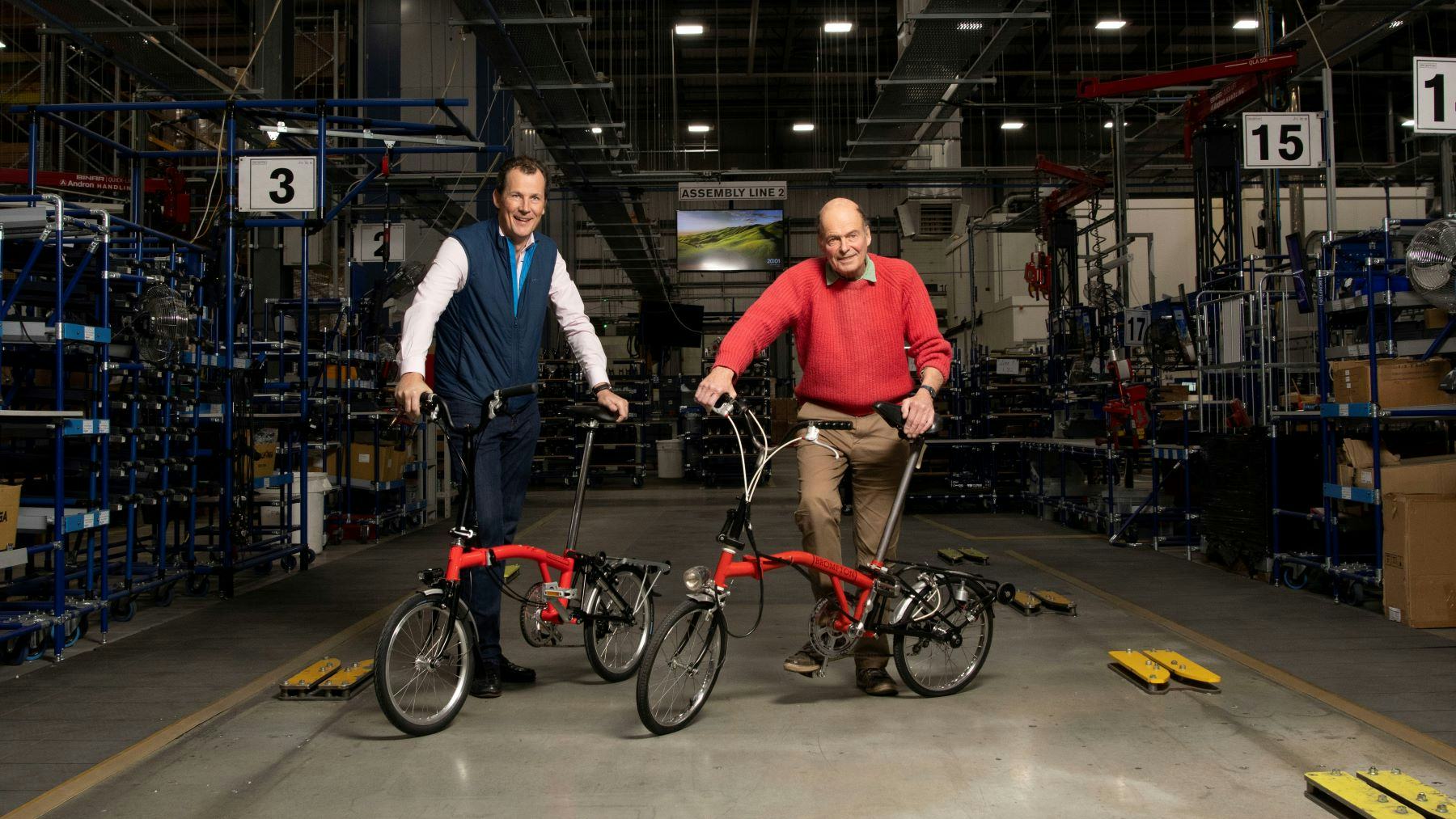 Founder Andrew Ritchie and current CEO Will Butler Adams with the one millionth Brompton folding bike. – Photo Brompton