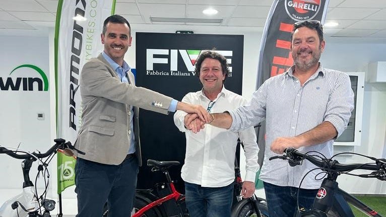 Andrea Casadei and Giacomo Galeazzi of Armony Group congratulate FIVE CEO Fabio Giatti with the take-over. – Photo FIVE
