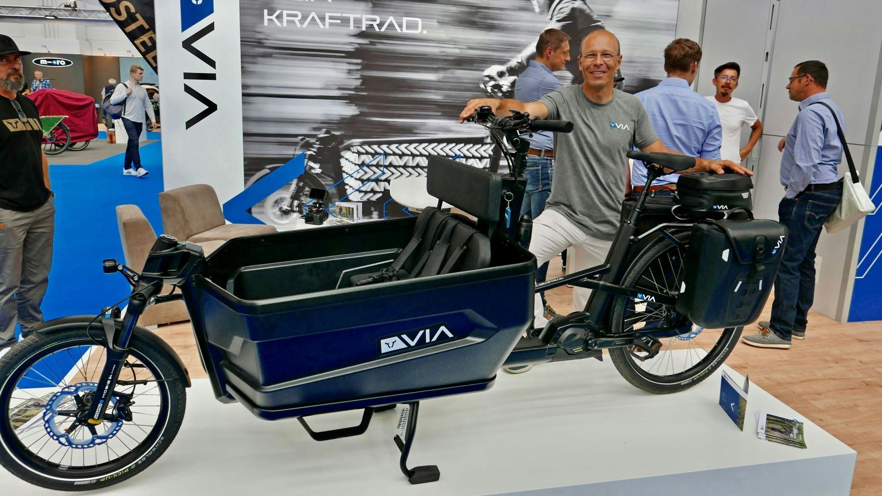 Via Project Manager Alexander Trofimow with the Cargobike model Via 1 at Eurobike. – Photo Jo Beckendorff