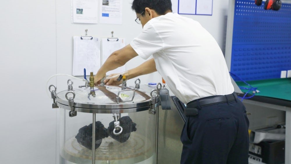 A Bafang engineer operating the air tightness tester. – Photo Bafang