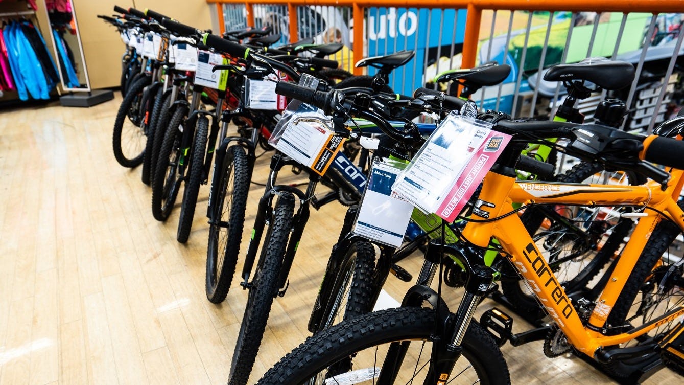 “The UK cycling market was impacted by a combination of continued weak customer confidence and unusually mild and very wet weather,” writes the UK retailer. – Photo Halfords 