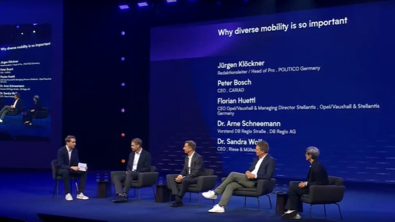On the main stage at IAA the CEO of German e-bike and cargo-bike manufacturer Riese & Müller called for a level playing field for all forms of mobility on a political level. – Photo IAA Mobility