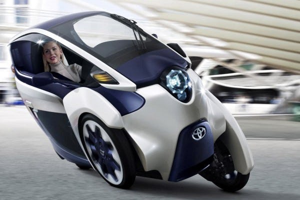 The Toyota trike is an example of how automakers intend to fill the gap that exists between electric bicycles and electric cars. - Photo Toyota 
