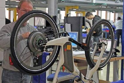 "I am impressed by the e-bike production according to automotive standards", said Tony Grimaldi, Cycleurope&apos;s CEO at the annoucement of his company&apos;s cooperation with MIFA. - Photo Bike Europe