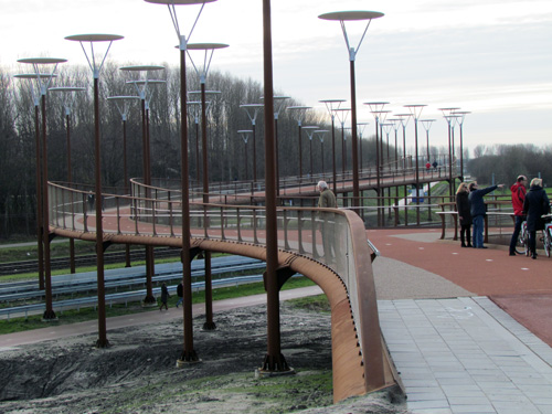 Europe’s biggest bike bridge cost 3.2 million euro. It links several cities in the Western and most populated part of Holland. – Photo Bike Europe
