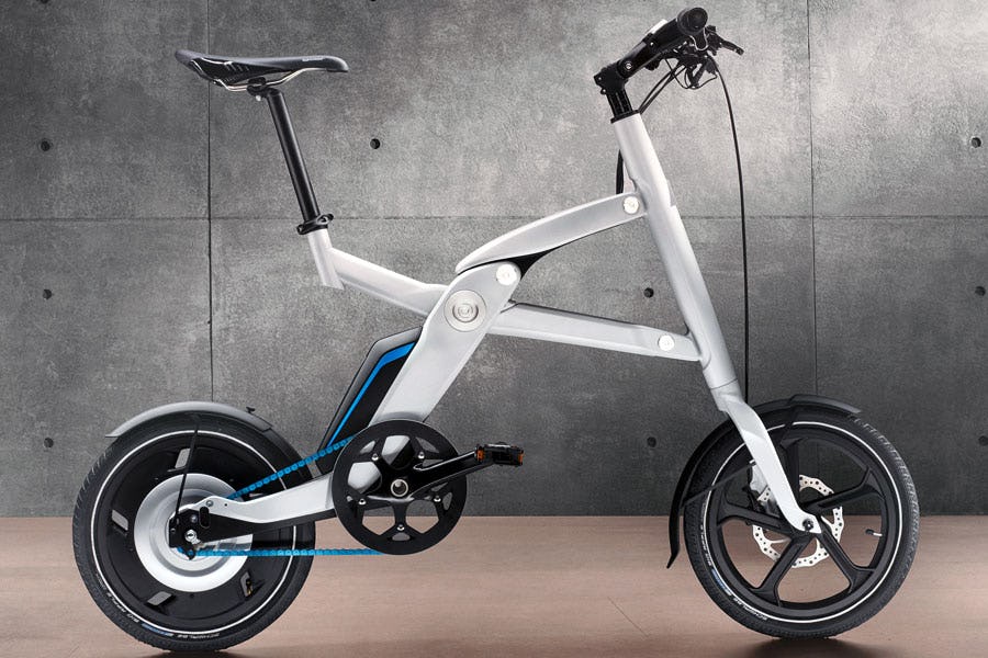 BMW Integrates (Folding) E-Bikes in E-Car Concept