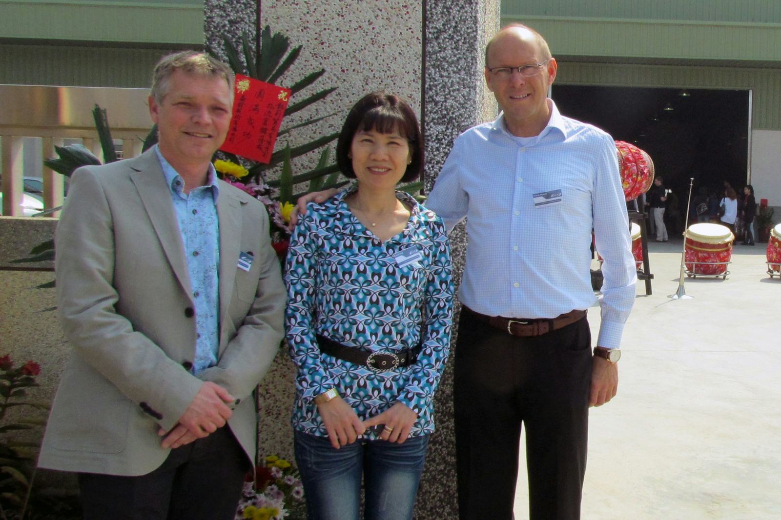 BBB founders Chris Koppert (left) and Frank Moons together with their Taiwanese partner Carrie Tsai from EC Sports, at the opening of their logistic centre in Taichung, Taiwan in 2011. – Photo Bike Europe