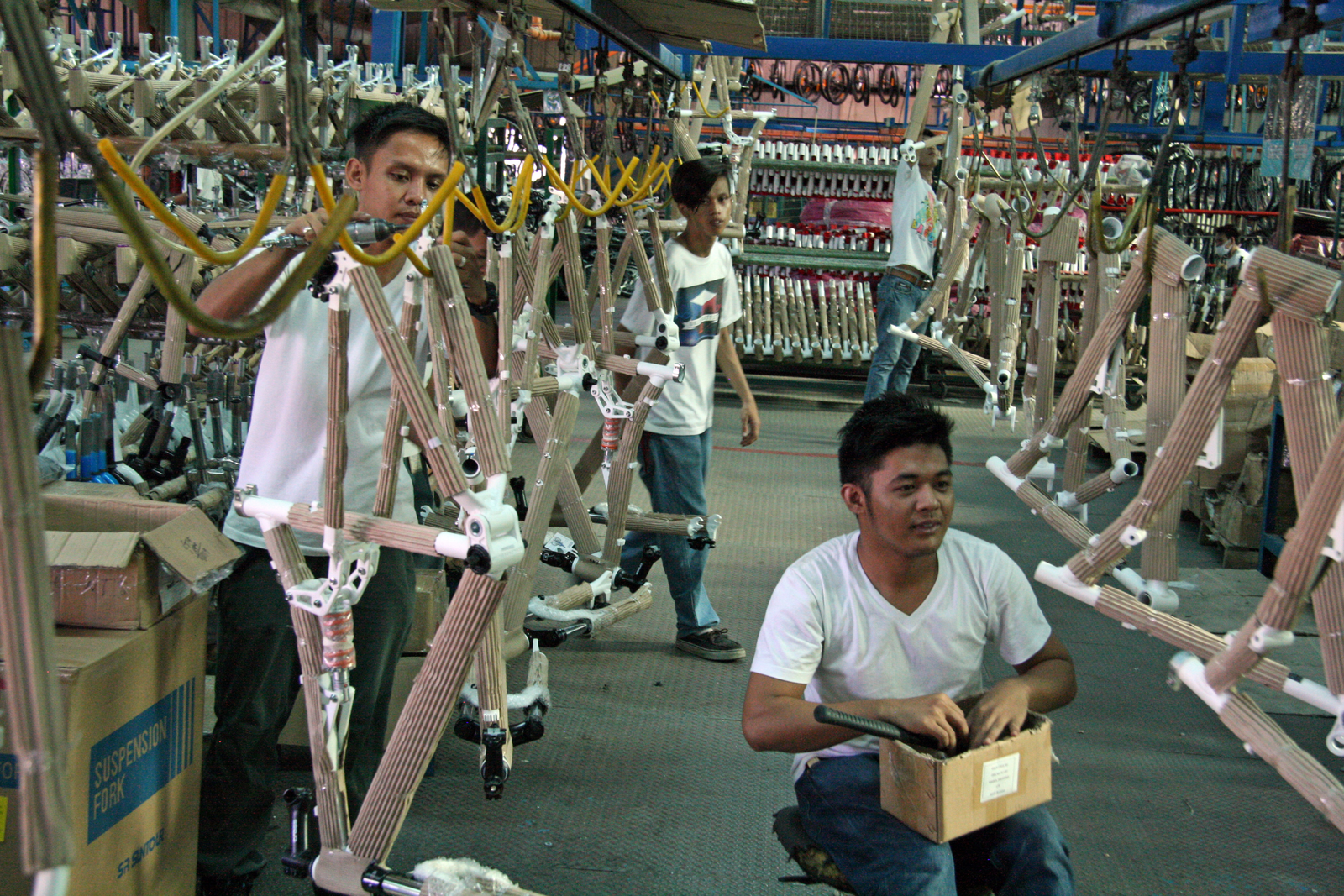 Production at one of the bike producers in the Philippines. – Photo Jo Beckendorff