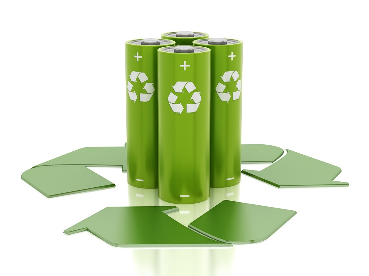 Environment friendly green batteries with recycle icons isolated on white.