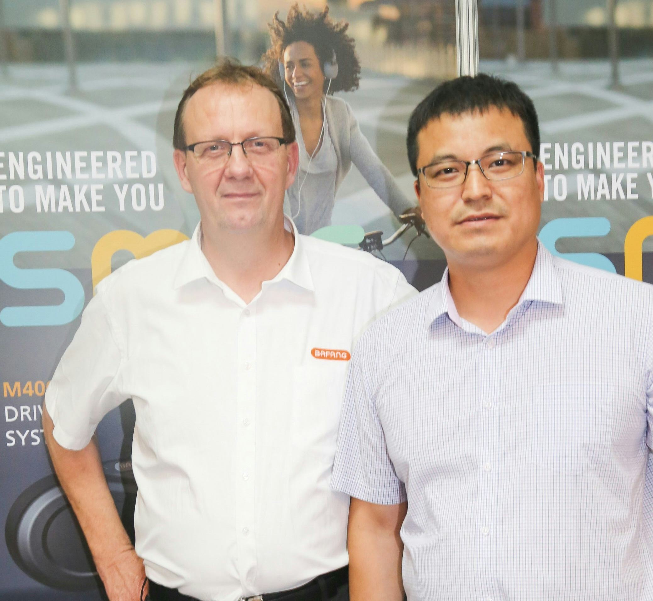 Bafang co-founder Sunny He (right) welcomes Andre Fuchs as country manager for German-speaking markets. – Photo Bafang 