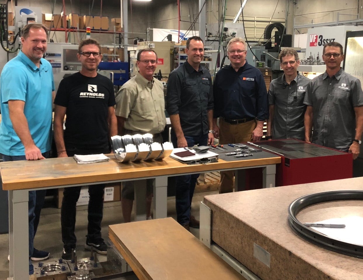 The Reynolds team together with two Hayes managers after signing the contract at Reynolds production, R&D, and HQ facility in Salt Lake City, US. – Photo Hayes Performance Systems