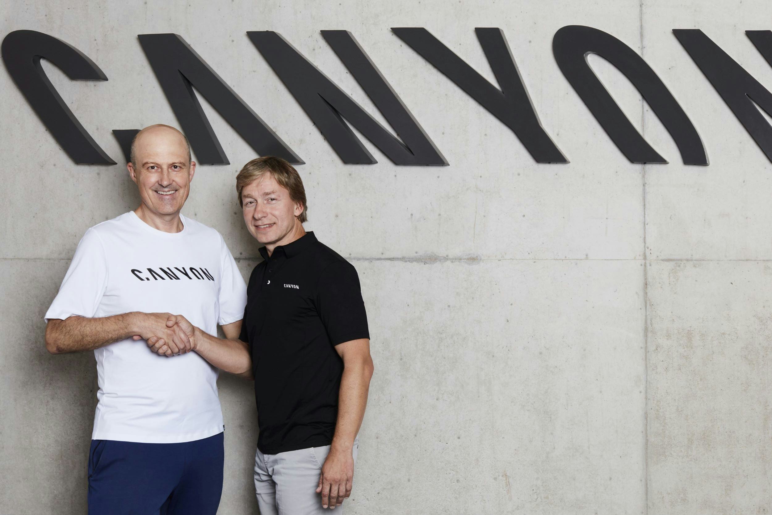 Canyon Bicycles founder Roman Arnold (left) hands over his CEO role to Armin Landgraf. - Photo Canyon Bicycles