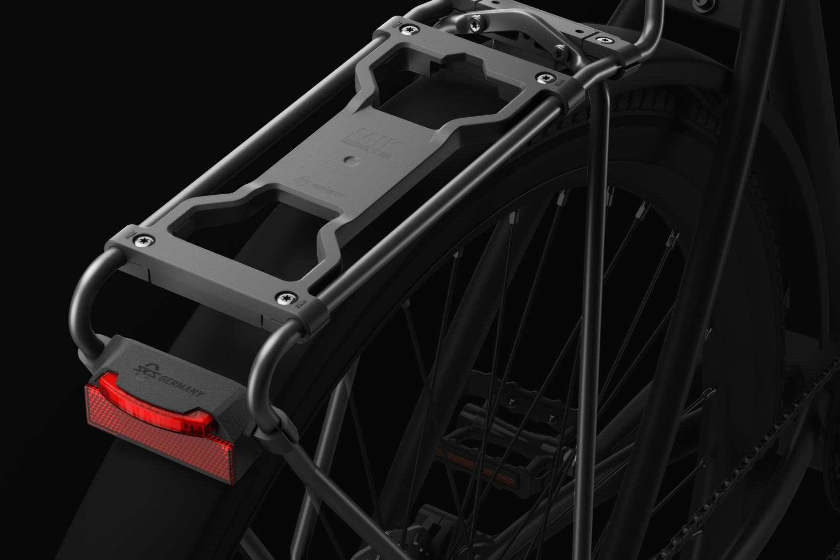 The integrated Spanninga rear light is a key feature of SKS Germany’s new Infinity luggage carrier. – Photo Spanninga