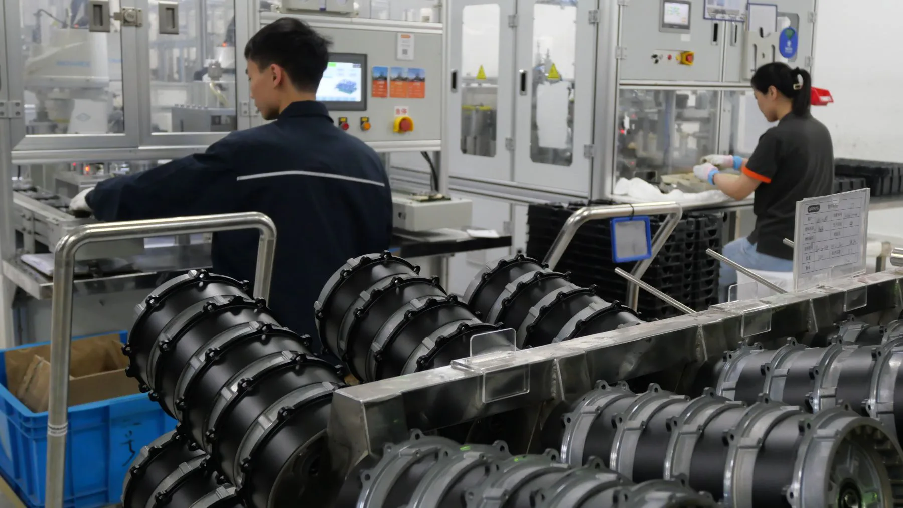 Workers oversee automated production lines at Bafang's Suzhou factory, where the company continues to expand manufacturing capacity and efficiency. – Photos Bike Europe